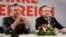FILE - Norbert Hofer (L) and Heinz-Christian Strache of Austria's anti-migrant and anti-EU Freedom Party (FPO) attend a news conference in Vienna, Austria, Dec. 6, 2016.
