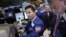 Traders work on the floor at the New York Stock Exchange in New York, January 2, 2013.