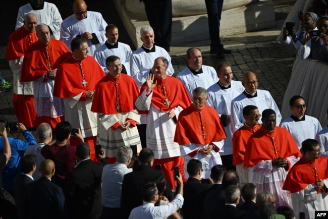 Future cardinals arrive for a ceremony to create 21 new cardinals at St. Peter's Square in The Vatican on September 30, 2023. (Photo by Filippo MONTEFORTE / AFP)