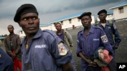 FILE - Policemen gather at a training center near the eastern Congolese town of Goma.