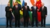 Indian Prime Minister Narendra Modi, China's President Xi Jinping, South Africa's President Cyril Ramaphosa, Russia's President Vladimir Putin and Brazil's President Michel Temer pose for a group picture at the BRICS summit meeting in Johannesburg, South 