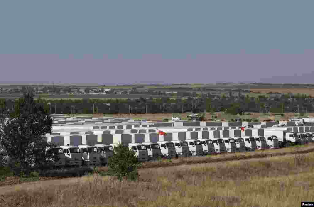 A Russian convoy of trucks carrying humanitarian aid for Ukraine is parked at a camp near Kamensk-Shakhtinsky, Rostov Region, Aug. 15, 2014.