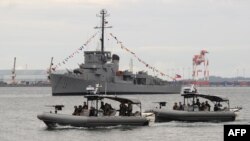 Philippine Navy special operations group on board speed boats patrol off Subic Bay, facing South China Sea, Aug. 6, 2013.