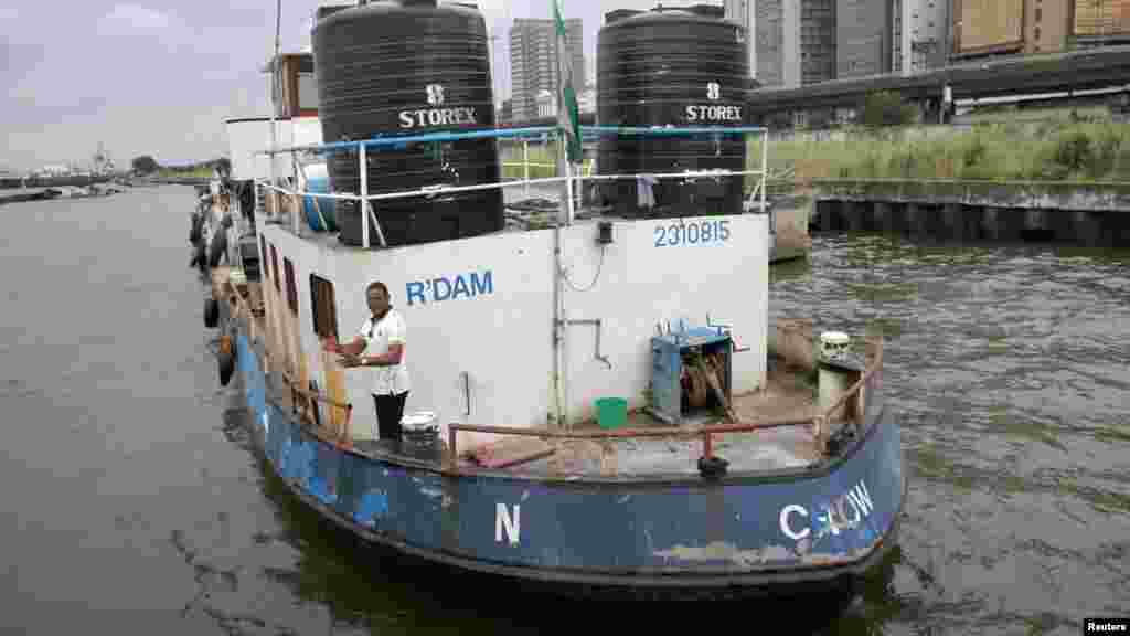 A ship loaded with refined fuel is anchored after it was seized from suspected pirates at a defence jetty in Lagos, August 20, 2013.