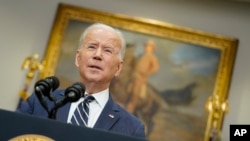 President Joe Biden announces that along with the European Union and the Group of Seven countries, the U.S. will move to revoke "most favored nation" trade status for Russia over its invasion of Ukraine, March 11, 2022, at the White House.