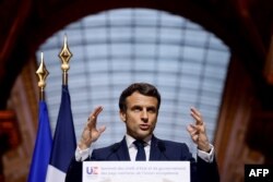 France's President Emmanuel Macron holds a press conference following an EU leaders summit to discuss the fallout of Russia's invasion in Ukraine, at the Palace of Versailles, near Paris, on March 11, 2022.