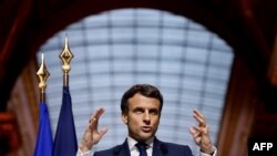 France's President Emmanuel Macron holds a press conference following an EU leaders summit to discuss the fallout of Russia's invasion in Ukraine, at the Palace of Versailles, near Paris, on March 11, 2022.