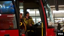 Warsaw firefighters have been at the forefront of assisting Ukrainian refugees. (Jamie Dettmer/VOA)