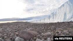 The site of field work at the edge of the Greenland Ice Sheet where scientists studied the age of the 31- km-wide Hiawatha impact crater that is buried under ice six-tenths of a mile (1 km) thick is seen in 2019. (Pierre Beck/Handout via REUTERS)