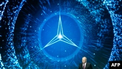 FILE - Russian President Vladimir Putin speaks as he attends an opening ceremony of the Mercedes-Benz automobile assembly plant outside Moscow, April 3, 2019. 