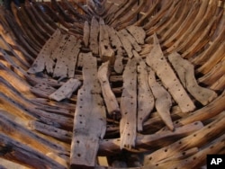 This 2007 photo provided by the Pilgrim Hall Museum, shows collection of 109 surviving timbers from the 1626 shipwreck of the Sparrow-hawk at the Pilgrim Hall Museum, in Plymouth, Massachussetts.