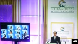 FILE - Secretary of State Antony Blinken addresses the 16th annual International Women of Courage (IWOC) Awards virtual ceremony at the State Department, March 14, 2022.