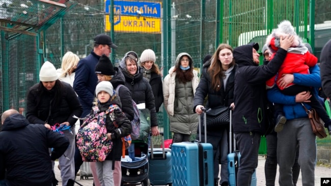 Flüchtlinge über die ukrainische Grenze - Polen