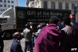 FILE - A truck belonging to the South African aid organization Gift of the Givers arrives in Cape Town, Oct. 31, 2019.