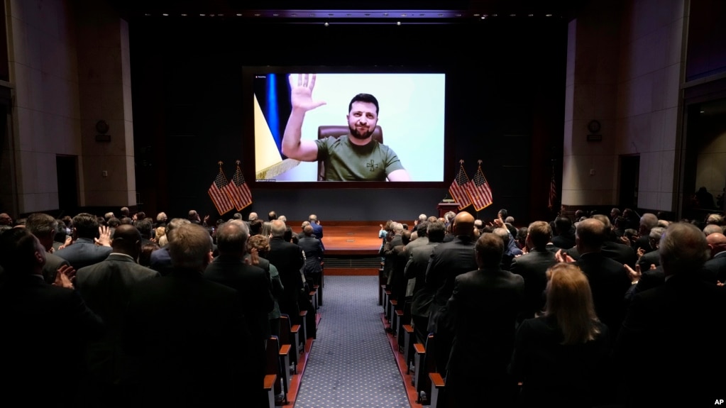 Ukrainian President Volodymyr Zelenskyy delivers a virtual address to Congress by video at the Capitol in Washington, March 16, 2022. (Drew Angerer, Pool via AP)