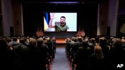 Ukrainian President Volodymyr Zelenskyy delivers a virtual address to Congress by video at the Capitol in Washington, March 16, 2022. (Drew Angerer, Pool via AP)