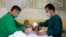 FILE - An Afghan boy receives medical care at the International Committee of the Red Cross physical rehabilitation center after being injured in fighting between the Taliban and Afghan security personnel, in Kabul, Afghanistan, Aug. 10, 2021.