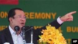 FILE - Cambodian Prime Minister Hun Sen delivers a speech at the launching ceremony of the Cambodia-China Friendship Preah Kossamak Hospital in Phnom Penh, Cambodia, Monday, March 21, 2022. (AP Photo/Heng Sinith)