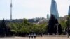 FILE - Police officers patrol in Baku, Azerbaijan, May 18, 2020.