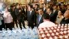 FILE - Cambodian Prime Minister Hun Sen, center right, tours an AEON mall accompanied by Japanese Foreign Minister Fumio Kishida, center left, in Phnom Penh, Cambodia, June 30, 2014. Kishida, now Japan's prime minister, will meet with Sen this weekend in 