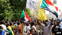 Sudanese protesters take part in ongoing demonstrations calling for civilian rule and denouncing the military administration, in Sudan's capital Khartoum on March 14, 2022. 