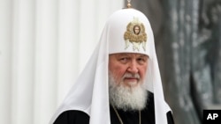 FILE: Russian Orthodox Church Patriarch Kirill, during a ceremony to present him the Order of St. Andrew in the Kremlin in Moscow, Russia, Nov. 20, 2021. 