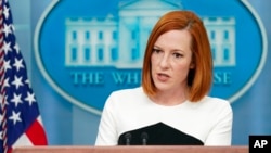 FILE - White House press secretary Jen Psaki speaks during a press briefing at the White House, March 14, 2022.