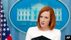 FILE - White House press secretary Jen Psaki speaks during a press briefing at the White House, March 14, 2022.