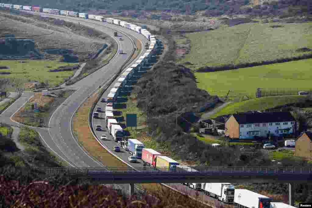 Trucks line up&nbsp;to enter a boat terminal at the Port of Dover, Britain.