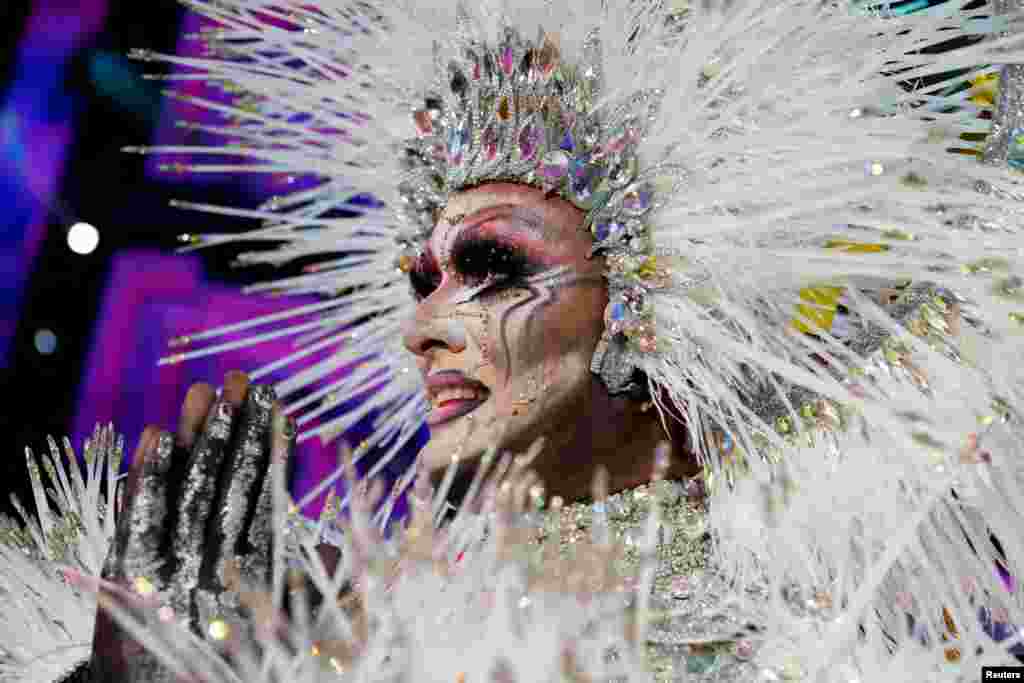 A participant named Drag Vulcano reacts after winning a drag queen competition during carnival festivities in Las Palmas on the Spanish Canary Island of Gran Canaria, Spain, March 19, 2022.