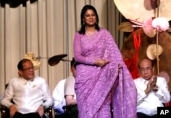 FILE - Syeda Rizwana Hasan from Bangladesh smiles to the crowd during an awards ceremony, in Manila, Philippines, Aug. 31, 2012.