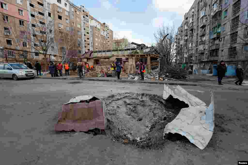 A view shows a crater caused by shelling during Ukraine-Russia conflict in the separatist-controlled town of Makeyevka (Makiivka) outside Donetsk, March 16, 2022.