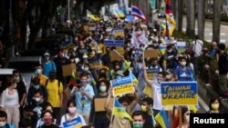 FILE - People attend a rally against Russia's invasion of Ukraine in Taipei, Taiwan, March 13, 2022. 
