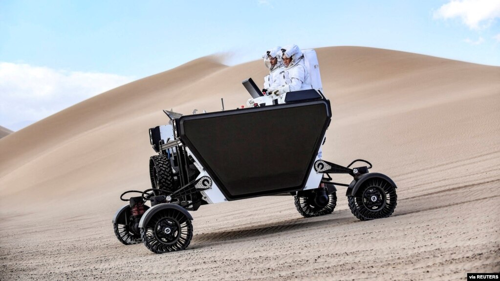 A handout image shows a prototype of California startup Astrolab 's Flex rover, that will be able to be operated directly by astronauts on the moon. The rover was tested in Death Valley National Park at the Dumont Dunes in December, 2021. (ASTROLAB/Handout)