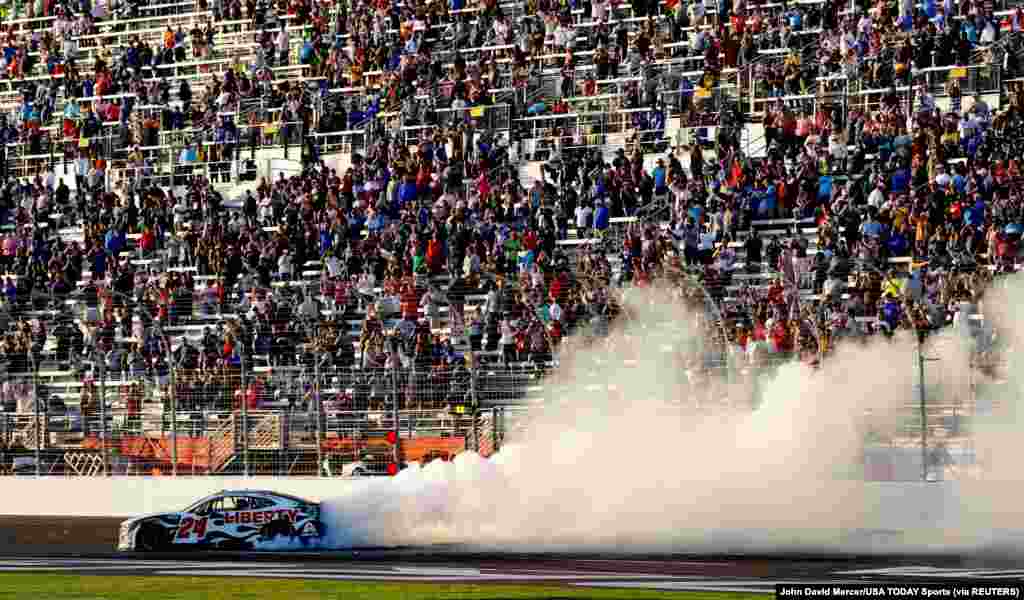 NASCAR Cup Series driver William Byron (24) performs a burnout as he celebrates winning the Folds of Honor QuikTrip 500 at Atlanta Motor Speedway in Hampton, Georgia, USA, March 20, 2022.
