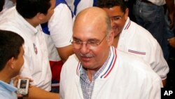 FILE - El Salvador's former President Alfredo Cristiani attends a Nationalist Republican Alliance, or Arena, general assembly in San Salvador, Oct. 10, 2008.