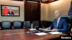 U.S. President Joe Biden holds virtual talks with Chinese President Xi Jinping from the Situation Room at the White House in Washington, March 18, 2022. (The White House/Handout via Reuters).