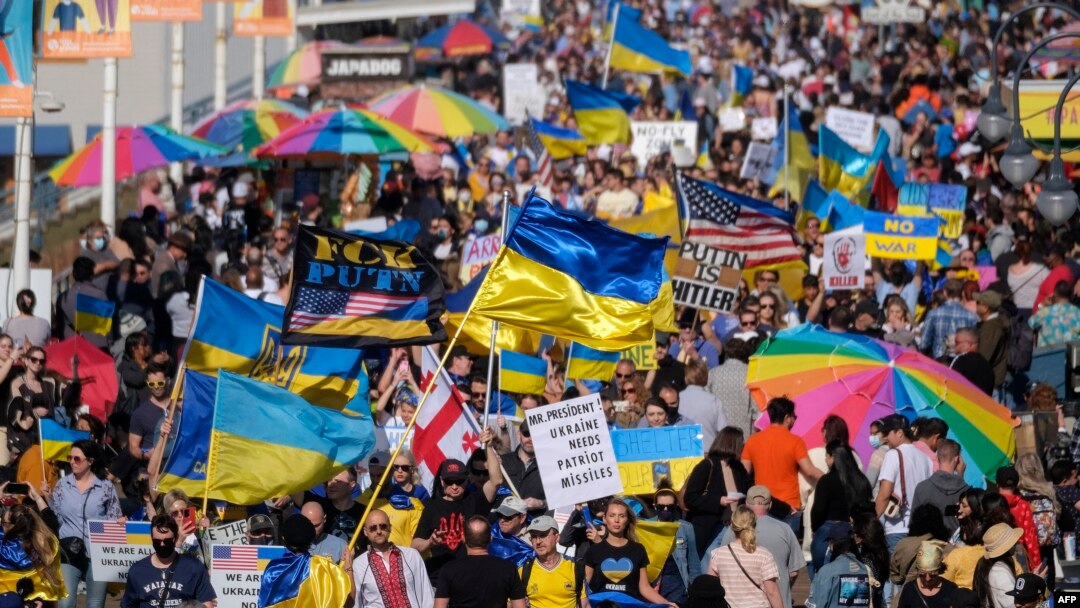 Demonstrators march during a rally in support of Ukraine in Santa Monica, California, on March 12, 2022.