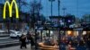 People eat in a McDonald's restaurant in the main street in Moscow, Russia, March 13, 2022. 