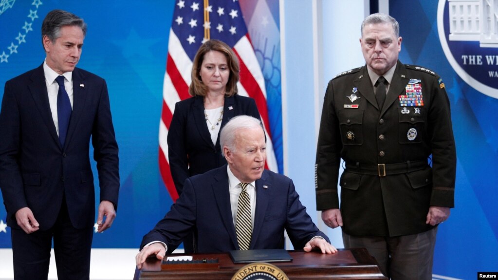 Presidenti Biden e quan udhëheqësin rus Vladimir Putin kriminel lufte