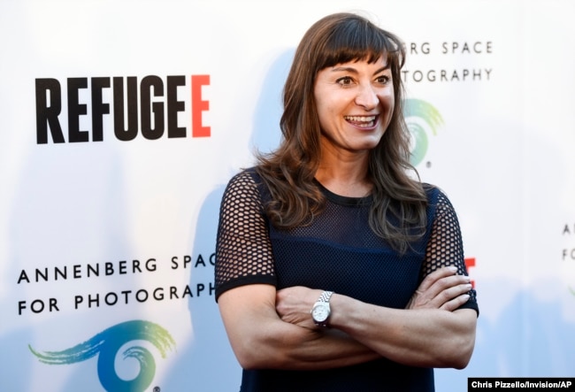 FILE - Photographer Lynsey Addario poses at the opening of the new photography exhibit "REFUGEE" at The Annenberg Space for Photography on Thursday, April 21, 2016, in Los Angeles. Addario is covering the war in Ukraine for The New York Times. (Photo by Chris Pizzello/Invision/AP)