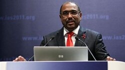 Michel Sidibe, head of the United Nations AIDS agency, speaks in Rome at a conference on HIV/AIDS