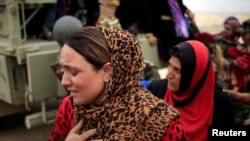 Abanyagihugu bashoboye kuva muvyara vy'umuhari wa reta ya Kiyisilamu mugisagara ca Mosul muri Iraki.