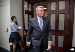 FILE - House Majority Leader Kevin McCarthy of California, emerges from a House Republican Conference meeting on Capitol Hill in Washington, July 28, 2017.