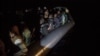 Des migrants à bord d'un bateau gonflable de l'organisation Proactiva Open Arms.