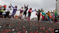 Participants take part in the women's 'Beauty Run' in Minsk, Belarus, March 8, 2020. 