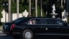 President Donald Trump waves from his limousine as he arrives at his golf club in West Palm Beach, Florida, March 8, 2025. 