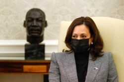 U.S. Vice President Kamala Harris and U.S. President Joe Biden (not pictured) attend a meeting with bipartisan Senators on infrastructure investment at the Oval Office of the White House in Washington, U.S., February 11, 2021. REUTERS