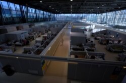 FILE - A general view of a makeshift hospital for coronavirus patients set up at the Sokolniki Exhibition and Convention Center in Moscow, Russia, Nov. 9, 2020.