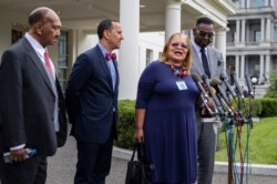 Alveda King, second from right, niece of civil rights leader Martin Luther King Jr., together with other religious leaders, speaks to reporters following a meeting with President Donald Trump at the White House in Washington, July 29, 2019.